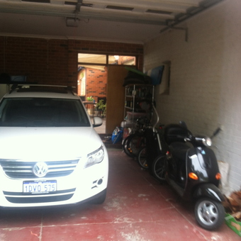 Organized Garage with Car, Scooter, and Storage Shelf - Arthur from Santa Fe, NM