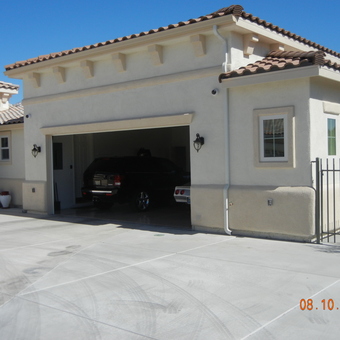 Stucco Garage With Tile Roof and Double Car Entry - Anonymous