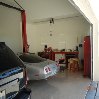 Organized Garage with Tool Cabinets, Workbench, and Lighting - Lighting