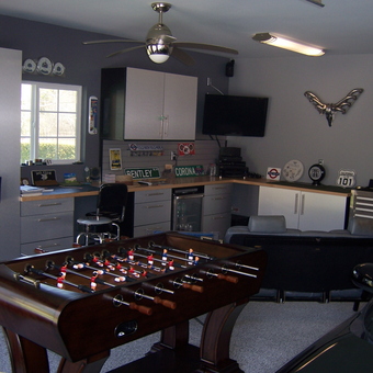 Modern Garage with Cabinets, Foosball Table, and Decor - jagbuxx from Simi Valleyq, CA