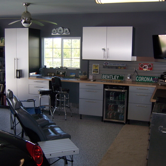 Modern garage with cabinets, mini fridge, and bar stools - jagbuxx from Simi Valleyq, CA