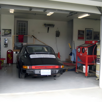 Organized garage with classic Porsche, tools, and sandblasting cabinet - Robert J. Williams from Van-, TX
