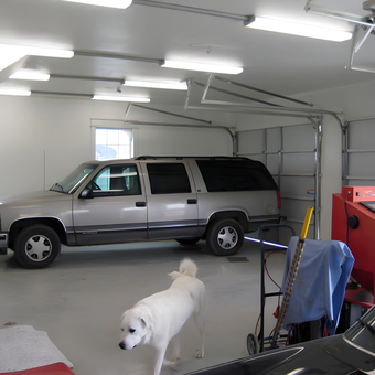 Spacious garage with SUV, sandblasting cabinet, and lighting - Robert J. Williams from Van-, TX
