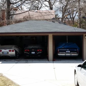 Three Car Garage With Covered Vehicles - Monster Booties from Detroit, MI