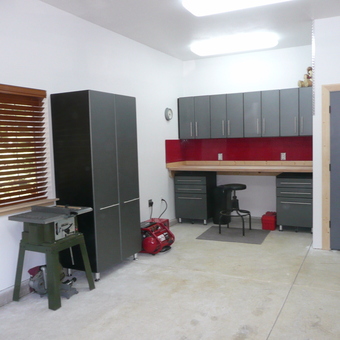 Modern garage with cabinets, tool chests, and workbench - Bruce from Truckee, CA