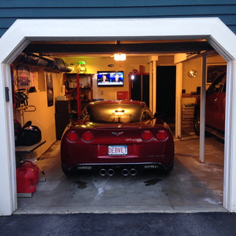 Organized garage with Corvette, wall storage, and TV - Gary from Dudley, MA