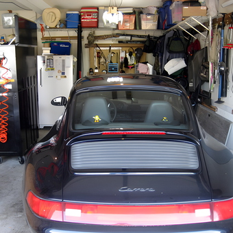 Organized Garage with Porsche, Cabinets, and Tools - tix from tampa, FL