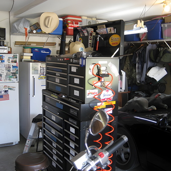 Organized garage with tool chests, fridge, and storage - tix from tampa, FL