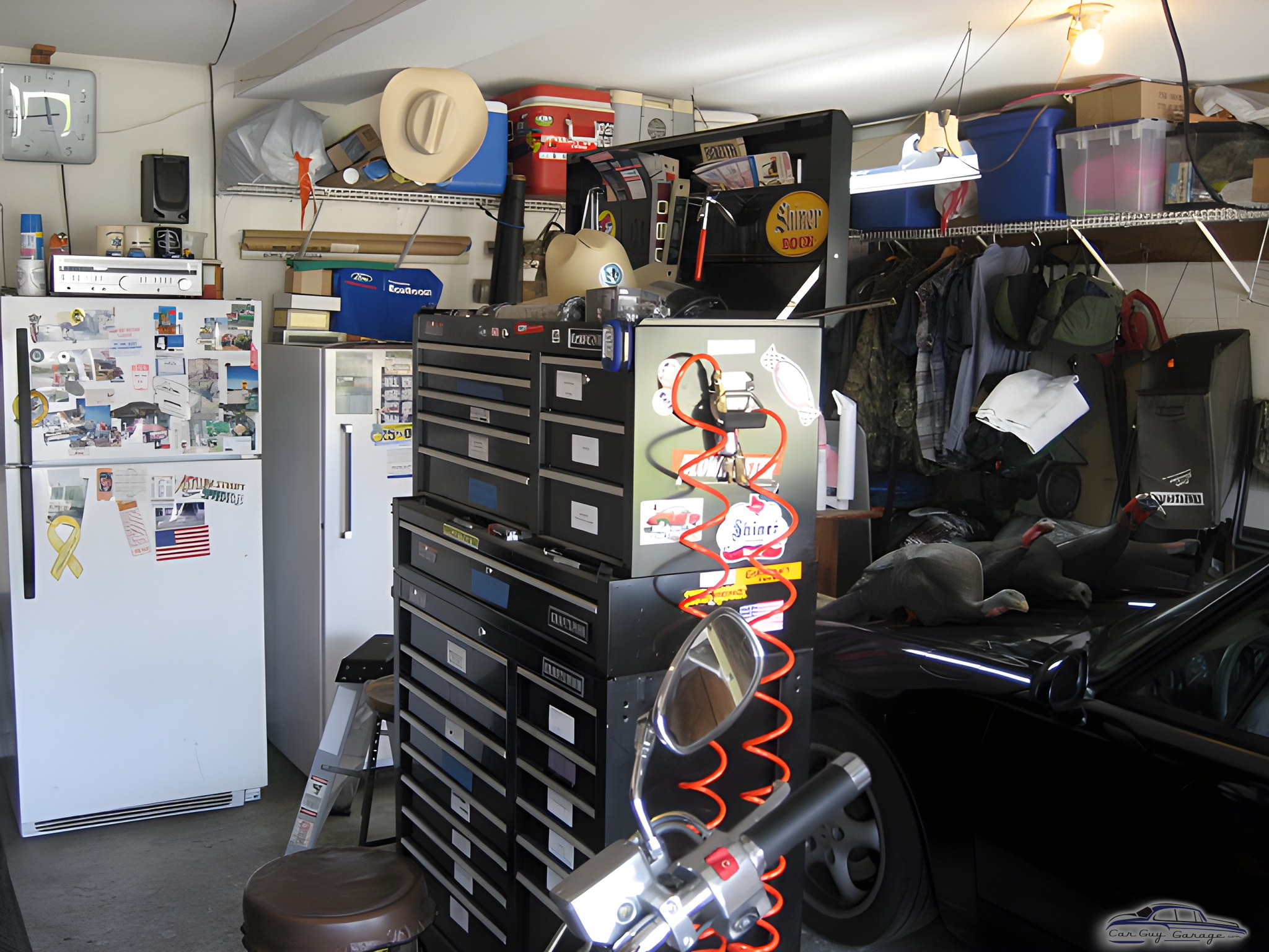 Organized garage with tool chests, fridge, and storage - tix from tampa, FL