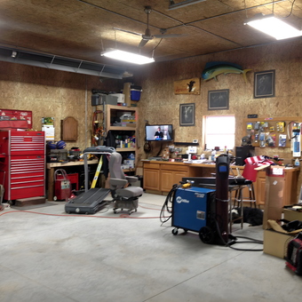 Organized garage with tool chest, welder, and storage cabinets - Ken from Moffat, CO