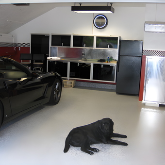 Modern garage with black cabinets and Corvette - Rick from Tyngsboro, MA