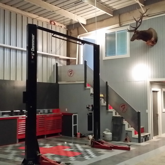 Modern garage with car lift and tool cabinets - Richard Felipe from Hanford, CA