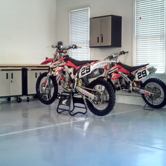 Organized garage with tool chest, cabinets, and dirt bikes - Mike from Charlotte, NC