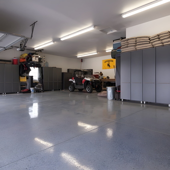 Spacious garage with storage cabinets and ATV - WyoNative from Casper, WY