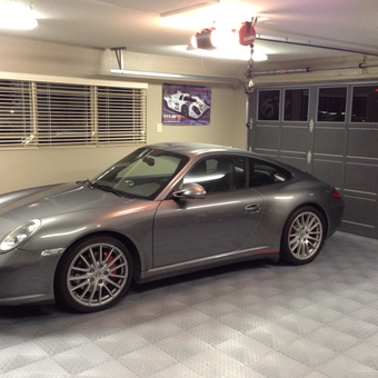 Modern garage with gray floor tiles and Porsche - Patrick from Campbell, CA