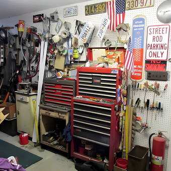 Organized garage with tool chests, signs, and pegboard - Jim Mothershead from Huntingtown, MD