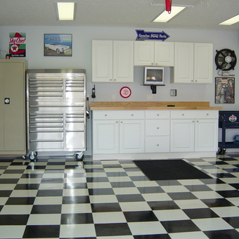 Organized garage with tool chest, cabinets, and checkered floor - Mike from North Ridgeville, OH
