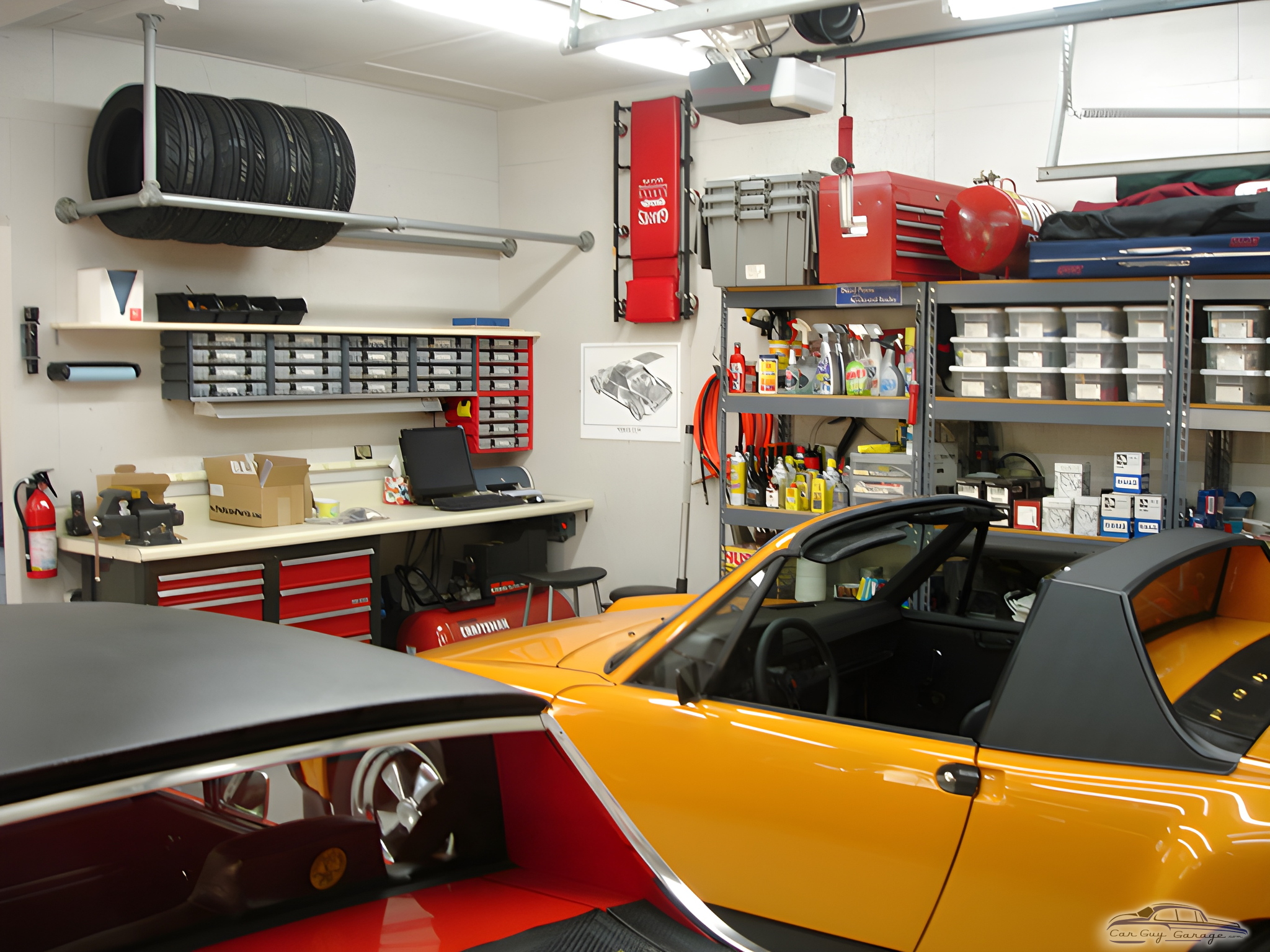 Organized garage with tool cabinets, wall storage, and cars - George from Clover, SC
