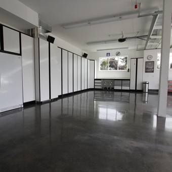 Modern garage with white cabinets and tool storage - Huiho from Tacoma, WA
