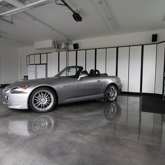 Modern garage with storage cabinets and convertible - Huiho from Tacoma, WA
