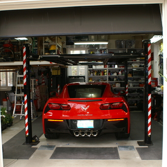 Garage Car Lift and Storage Shelves with Corvette - jerry carguy from pinckney, MI