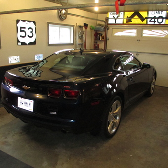 Garage with Camaro, License Plates, and Signs - Hwyman from Whitehall, WI
