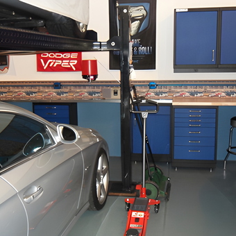Garage with Car Lift, Blue Cabinets, and Workbench - Larry from Naperville, IL