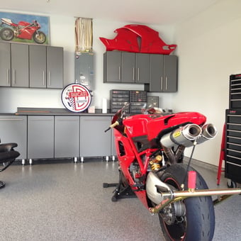 Modern garage with gray cabinets and motorcycle - Jim from Rochester, MN
