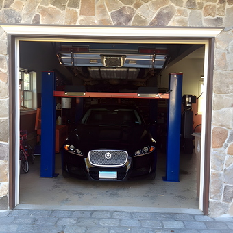 Two Post Car Lift with Vehicles in Stone Garage - John from Stamford, CT