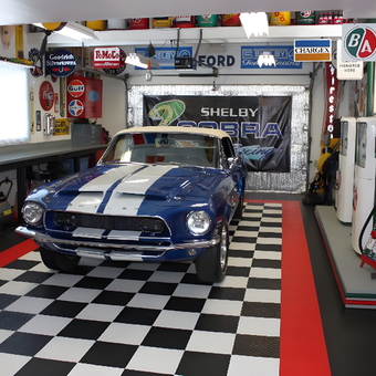 Classic Car Garage with Retro Signs and Pumps - Kent's Snakepit