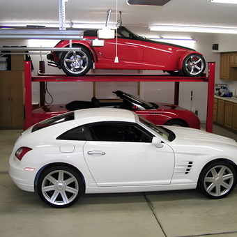 Garage Car Lift with Sports Cars and Cabinets - Tom from Niles, MI