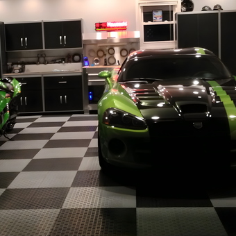 Checkered Garage Flooring with Cabinets and Lighting - Flooring