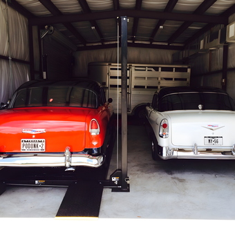 Classic Chevrolets on Car Lift in Spacious Garage - jesse's Cars from hempstead, TX