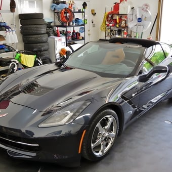 Organized garage with Corvette, shelving, and tools - Jason from Kingston, TN