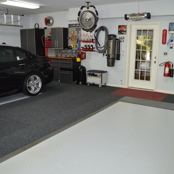 Organized Garage with Cabinets, Wall Storage, and Car - David Low from Kennesaw, GA