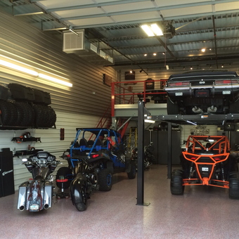 Organized garage with car lift, motorcycles, and ATVs - Rod from Chandler, AZ