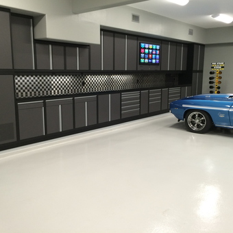 Modern Garage Cabinets and Checkered Backsplash - Speedy's Garage from Friendswood, TX