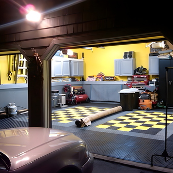 Organized garage with checkered flooring and cabinets - Cadillac Dave from Wakefield, MA