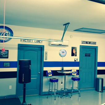 Garage With Bar Stools, Wall Art, and Signs - AcFroze from Foley, AL