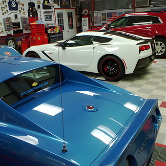Classic and Modern Cars with Decorated Garage Walls - Norm