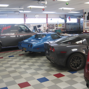 Corvettes, Club Van, and Memorabilia in Tiled Garage - Norm