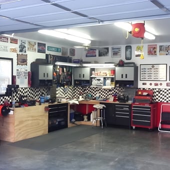 Organized garage with cabinets, tool chests, and decor - Ray from Madison, NC