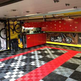 Custom garage with red cabinets and checkered flooring - Zanik from Parkridge, IL