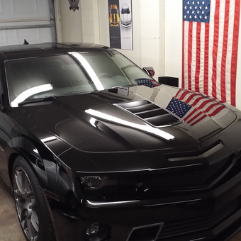 Black Camaro in Decorated Garage with Posters and Flag - Nick from Breaux Bridge, LA