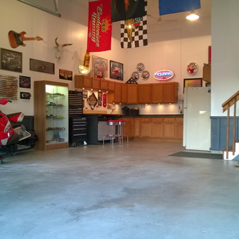 Organized garage with tool chest, display cases, and decor - Dennis from Champlin, MN