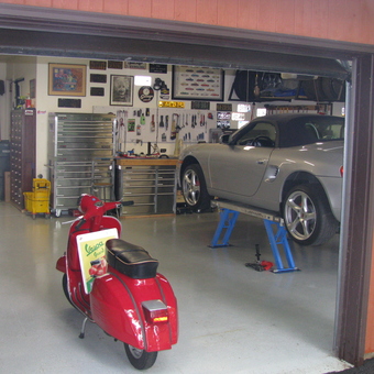 Organized garage with car lift, tool chests, and scooter - Wiley from Nazareth, PA