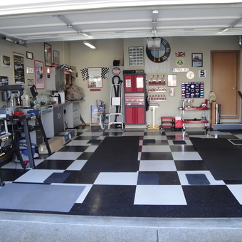 Organized garage with tool cabinets and checkered flooring - Topless Red from Spanaway, WA