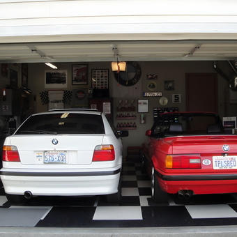 BMW Garage with Checkered Floor and Wall Decor - Topless Red from Spanaway, WA