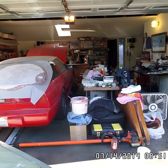 Red sports car, toolboxes, and workbenches in garage - 85300zxt from Stockton, CA