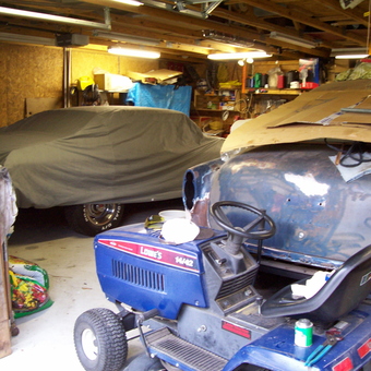 Classic Car Under Cover and Lawn Tractor in Garage - barryt from blythewood, SC